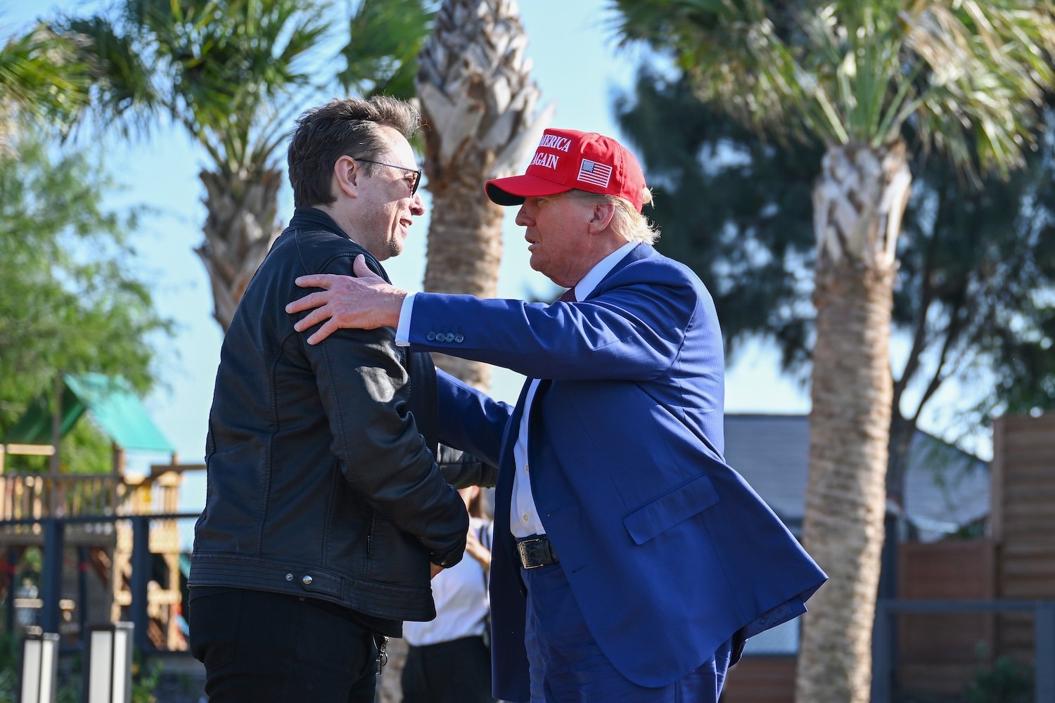 Donald Trump greets Elon Musk at a test flight of the SpaceX Starship rocket on November 19, 2024 in Brownsville, Texas.