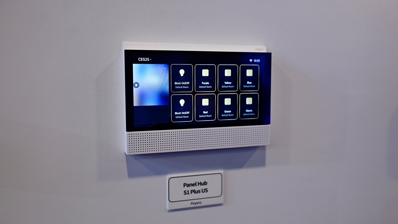 A smart home control panel mounted on a wall with various light settings displayed on the screen.