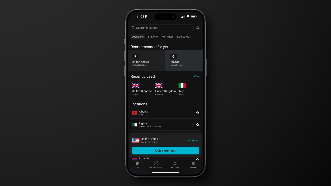 Smartphone exibindo um aplicativo VPN com opções de localização, incluindo Estados Unidos, Canadá, Reino Unido, Itália. Botão de conexão rápida na parte inferior. Interface de modo escuro.