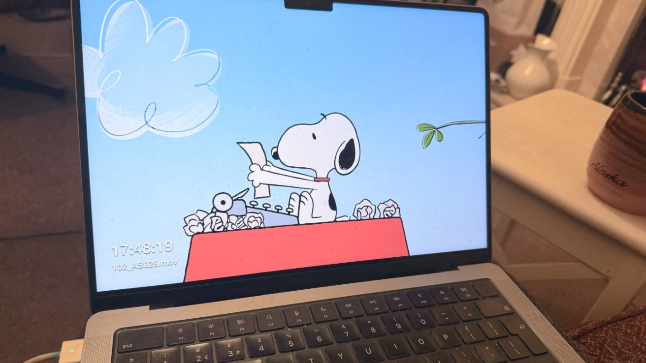 Como obter protetores de tela do Apple TV Snoopy em seu Mac