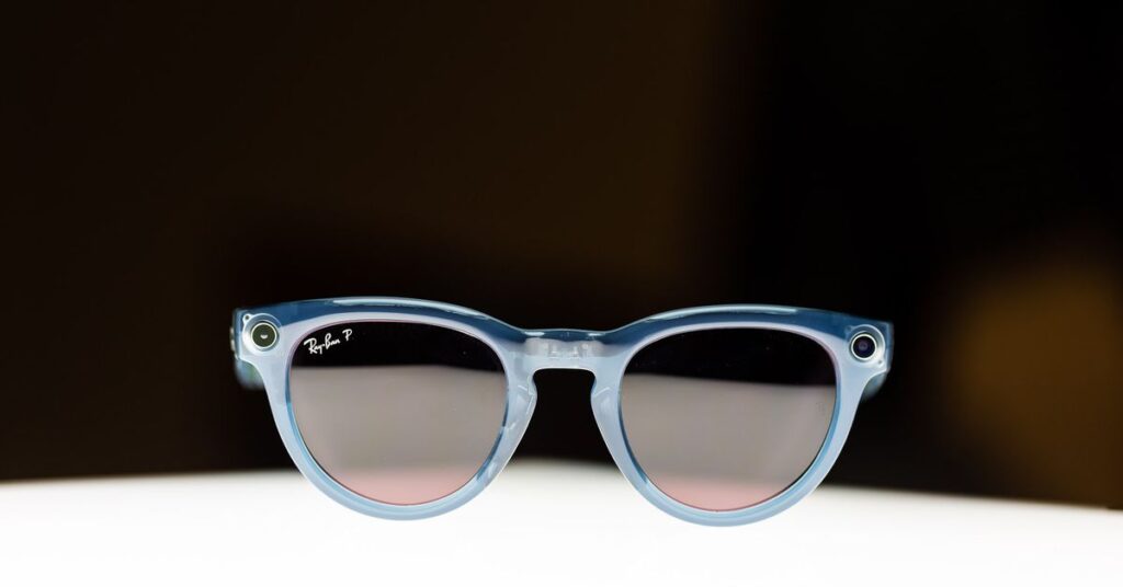 Close-up of Ray-Ban Meta smart glasses on an illuminated surface